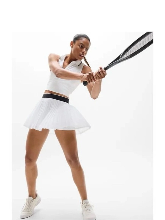 Athleta Dresses & Skirts - Athlete power serve  Women's White Pleated Tennis skort with Black Waistband